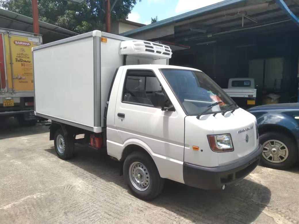  Refrigerated truck pre-cooling steps with open doors and running reefer unit